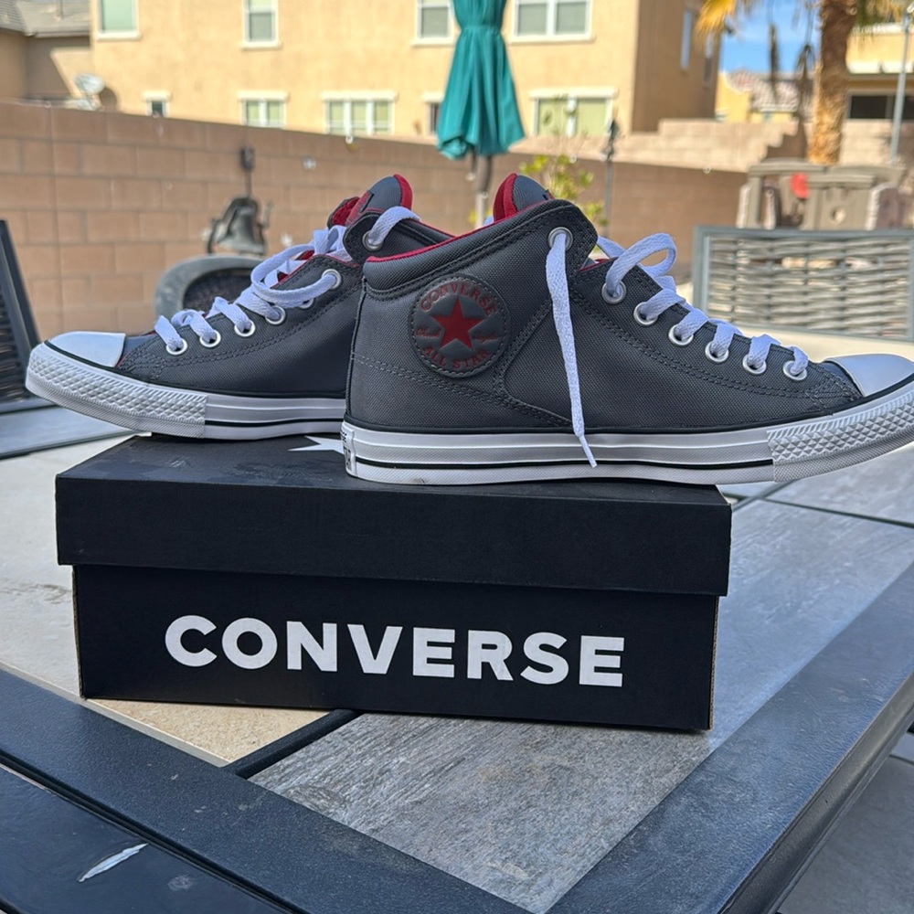 Brand new Converse athletic shoes size men’s 8, woman’s 10. No new tag but new.
